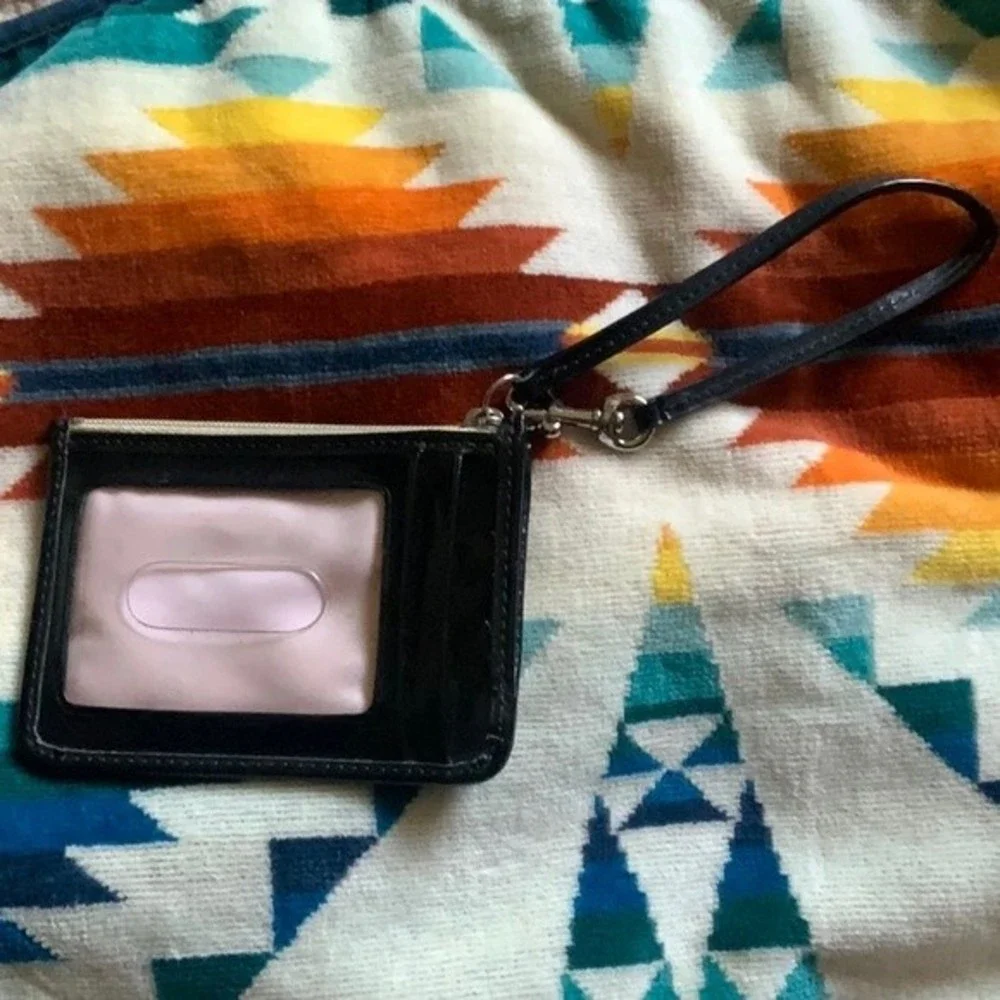 Coach Wristlet Multi-Color, Excellent Used Condition Measurements; 4.5’ X 3.5’.